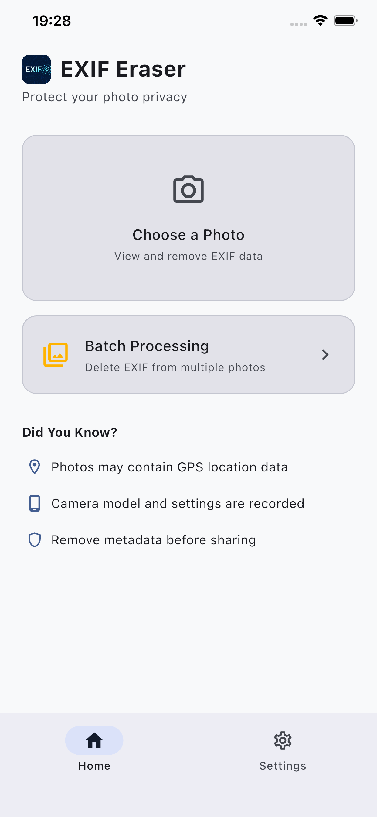 EXIF Eraser home screen showing Select Photo and Batch Processing buttons